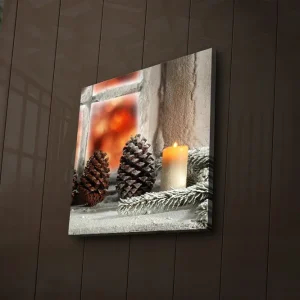 Canvastavla med LED-belysning 40x40 cm - Kottar och ett ljus på en vinterinspirerad bakgrund Mörkbrun / Beige / Grön - Inredning Erbjudandepris