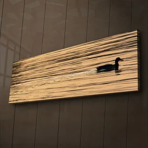 Canvastavla med LED-belysning 30x90 cm - Svart and simmande på spegelblanka, gyllene vattenytor Guld / Svart - Inredning Snabb leverans