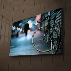 Canvastavla med LED-belysning 45x70 cm - Cykel i stadsmiljö med suddiga ljusreflexer Svart / Blå / Grå - Inredning Handla nu