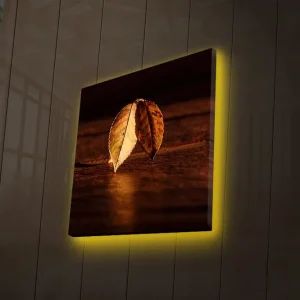 Rabatter Canvastavla med LED-belysning 40x40 cm - Två överlappande höstlöv på en träyta Guld / Brunt / Grönt - Inredning