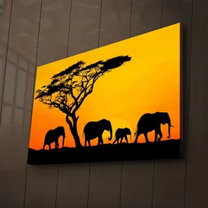 Köp online Canvastavla med LED-belysning 45x70 cm - Silhuetter av elefanter mot en solnedgång Orange / Svart - Inredning
