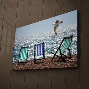 Canvastavla med LED-belysning 45x70 cm - Strandstolar vid havet med en flygande mås Grön / Blå / Vit - Inredning Nedsatt pris