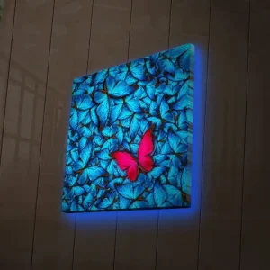 Canvastavla med LED-belysning 40x40 cm - Blåa upplysta fjärliar i bakgrunden med en rosa fjäril Blå / Rosa / Svart - Inredning Rabatt