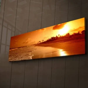 Canvastavla med LED-belysning 30x90 cm - Solnedgång över en strand med palmer i silhuett Orange / Guld / Brun - Inredning Begränsat antal