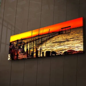 Canvastavla med LED-belysning 30x90 cm - Solnedgång över en brygga vid havet Orange / Guld / Blå - Inredning Kundfavorit