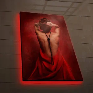 Canvastavla med LED-belysning 70x45 cm - Sensuell kvinna i röd klädnad med ryggen vänd mot betraktaren Röd / Svart - Inredning Begränsat antal