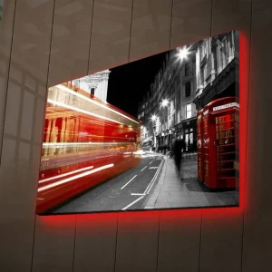 Canvastavla med LED-belysning 45x70 cm - Röd dubbeldeckare i rörelse på en svartvit stadsgata Röd / Svart / Grå - Inredning Sista chansen