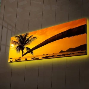 Canvastavla med LED-belysning 30x90 cm - Solnedgång över en strand med palmer och båtar Orange / Svart / Gult - Inredning Lägg i varukorgen