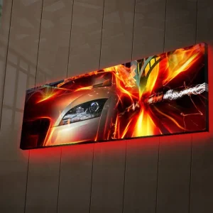 Canvastavla med LED-belysning 30x90 cm - Sportbil i rörelse med dynamiska ljuseffekter Röd / Orange / Svart - Inredning I lager