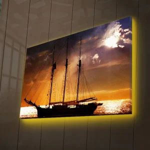 risnedsättning Canvastavla med LED-belysning 45x70 cm - Segelbåt mot en solnedgång över havet Orange / Svart / Guld - Inredning