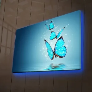 Canvastavla med LED-belysning 45x70 cm - Färgglada fjärilar som svävar över en spegelblanka yta Turkos / Blå / Svart - Inredning Outlet