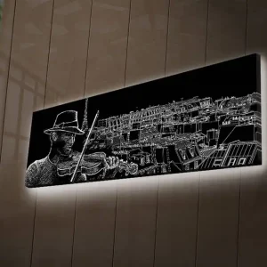 Rea Canvastavla med LED-belysning 30x90 cm - Musiker som spelar fiol med en stadssilhuett i bakgrunden Svart / Vit - Inredning