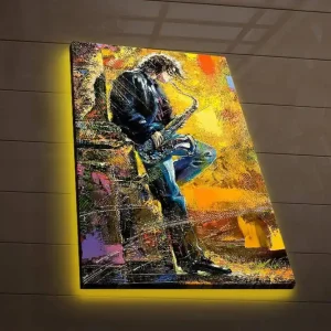 Utförsäljning Canvastavla med LED-belysning 70x45 cm - Jazzmusiker som spelar saxofon med en livfull bakgrund Gult / Blått / Svart - Inredning