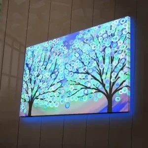 Reapris Canvastavla med LED-belysning 45x70 cm - Två stiliserade träd med färgglada cirklar som blommar i en drömlik bakgrund Blå / Grön / Svart - Inredning