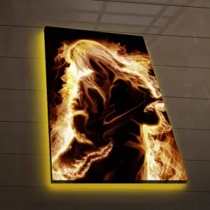 Erbjudandepris Canvastavla med LED-belysning 70x45 cm - Eldig silhuett av en gitarrist Guld / Orange / Svart - Inredning